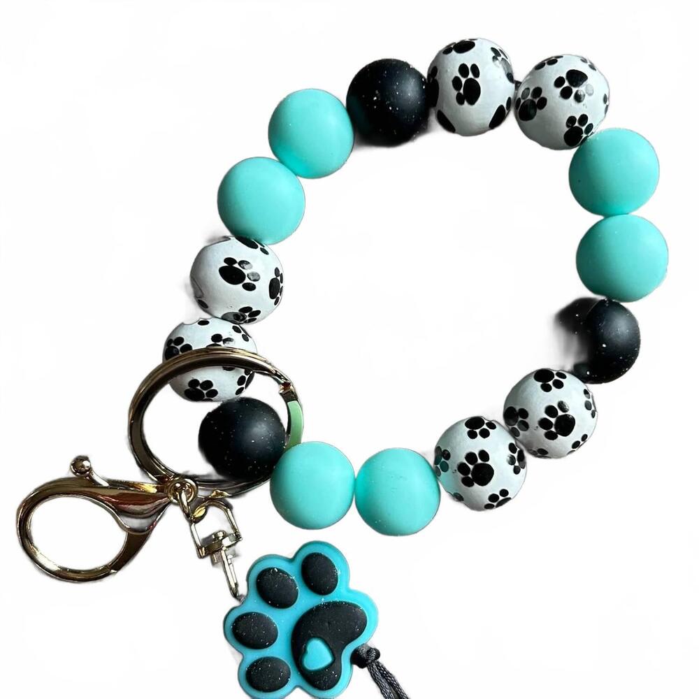 NEW JILLIAN INK women's paw print beaded wristlet bag charm in teal